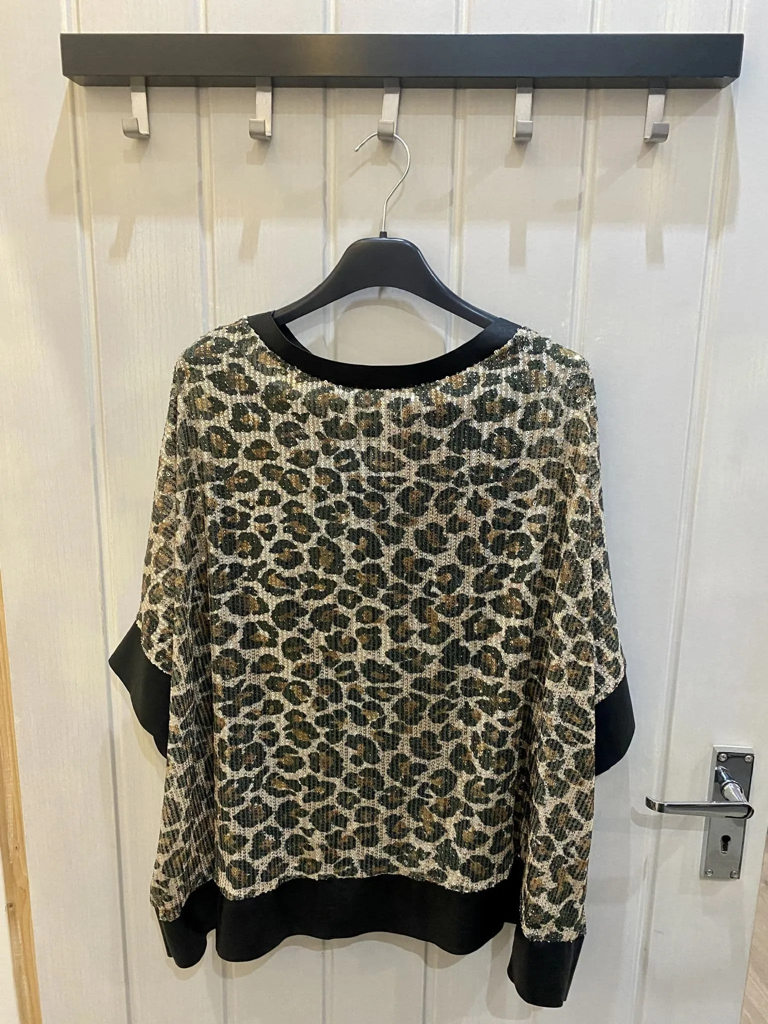 LEOPARD PRINT SEQUIN TOP WITH FAUX LEATHER DETAIL