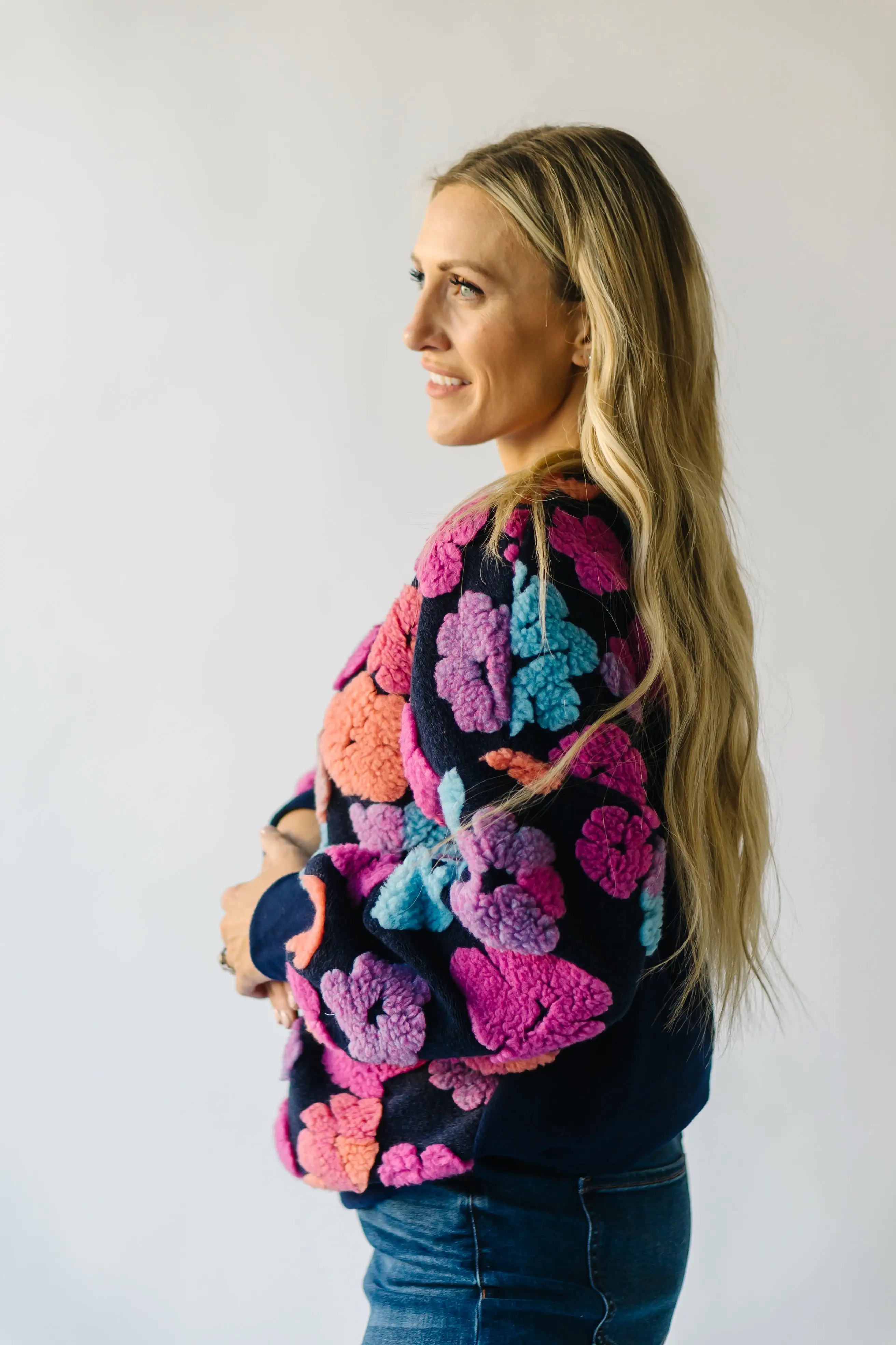 The Flanagan Sherpa Flower Detail Sweater in Navy + Fuchsia