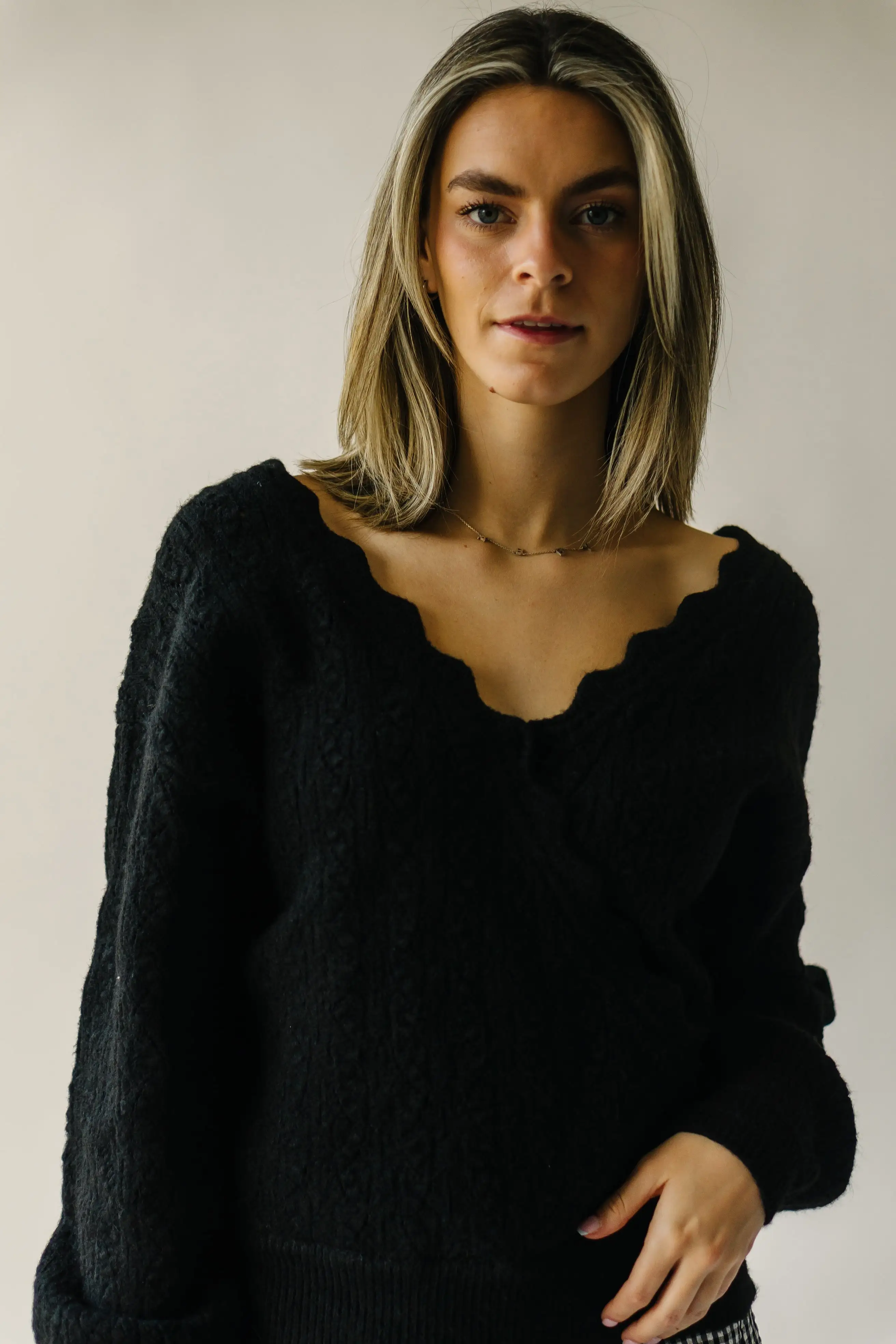 The Tagger Knit Wrap Sweater in Black