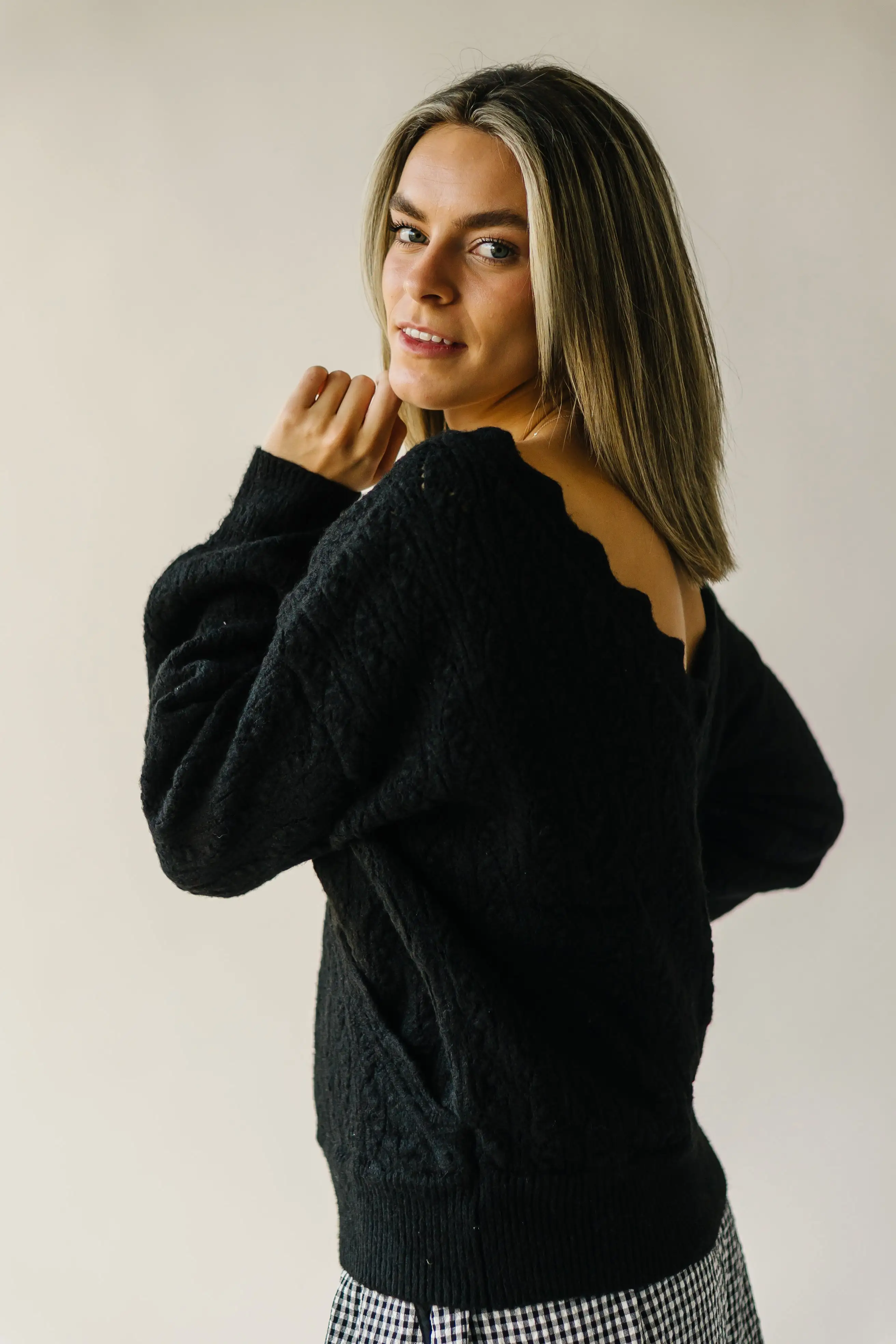 The Tagger Knit Wrap Sweater in Black