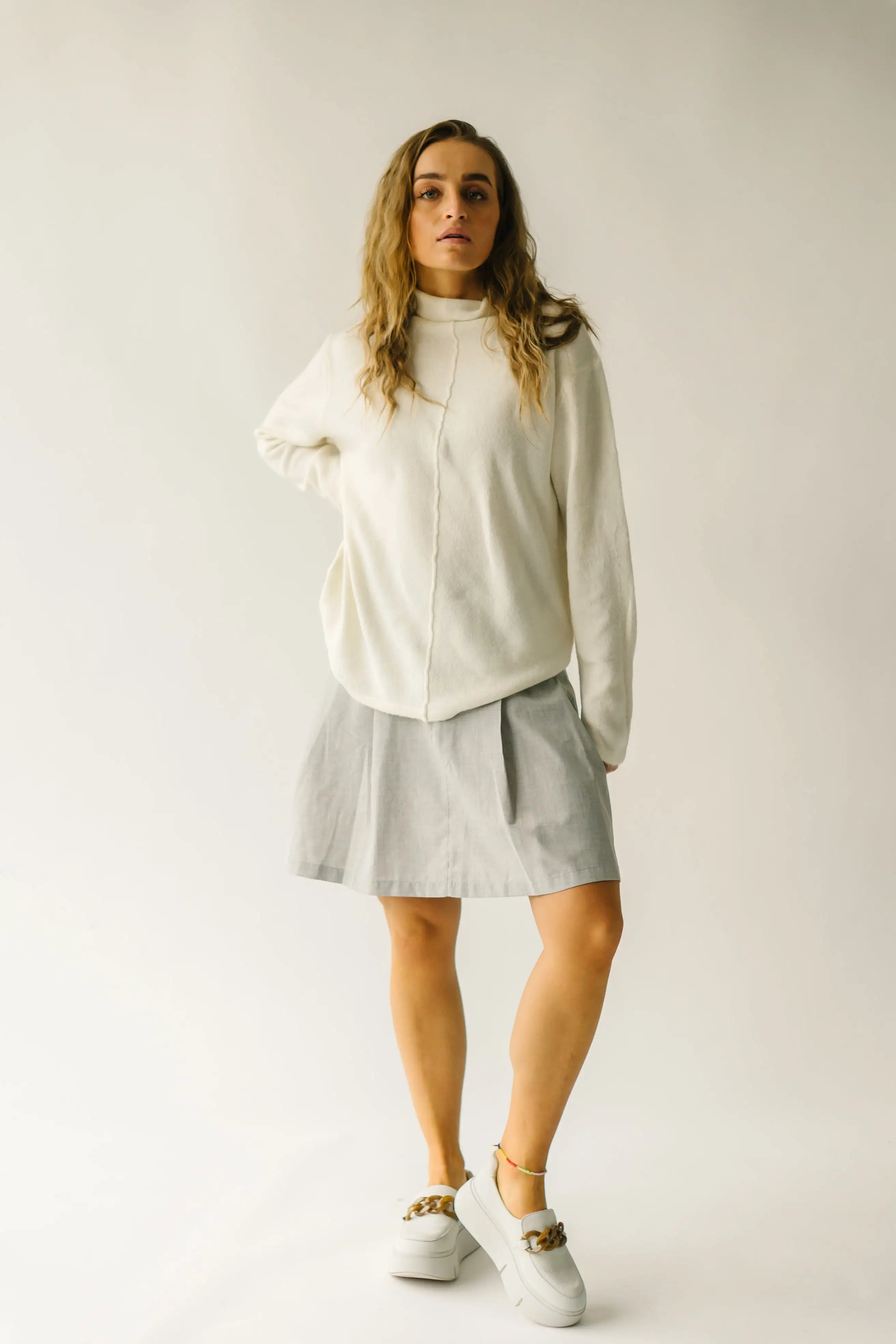 The Tindle Mock Neck Sweater in Cream