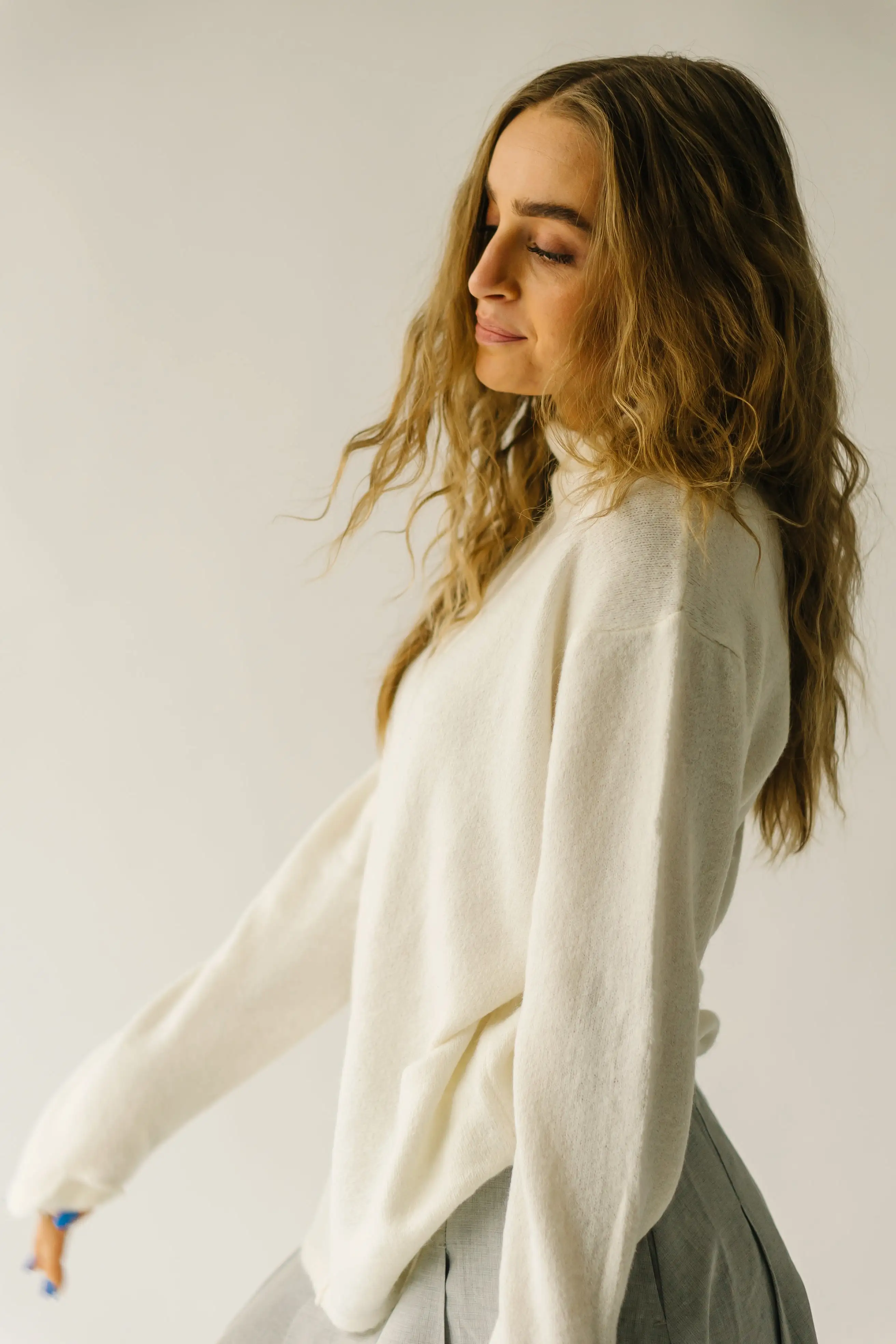 The Tindle Mock Neck Sweater in Cream