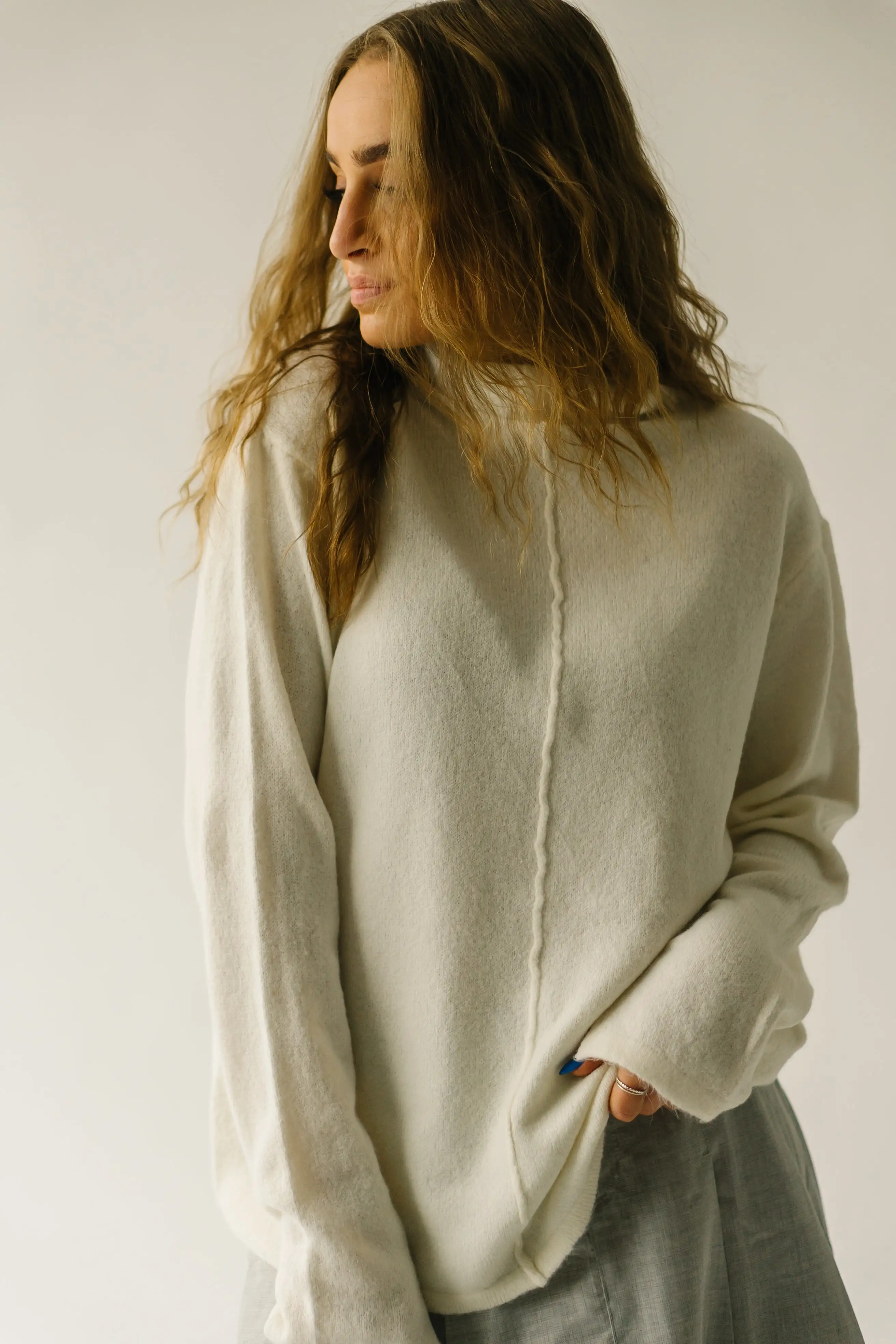 The Tindle Mock Neck Sweater in Cream